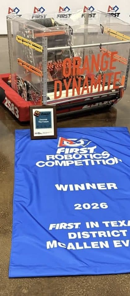 Team 2583 robot beside the 2026 FIT District McAllen Event winner banner